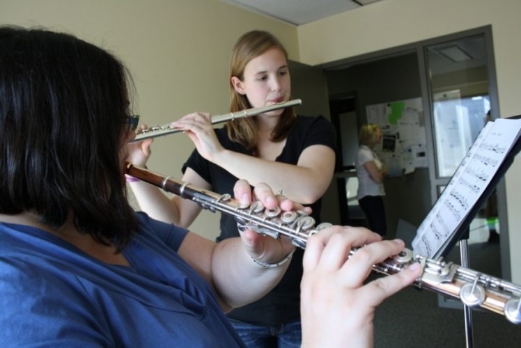 Flute teacher and student in lesson in Hamilton